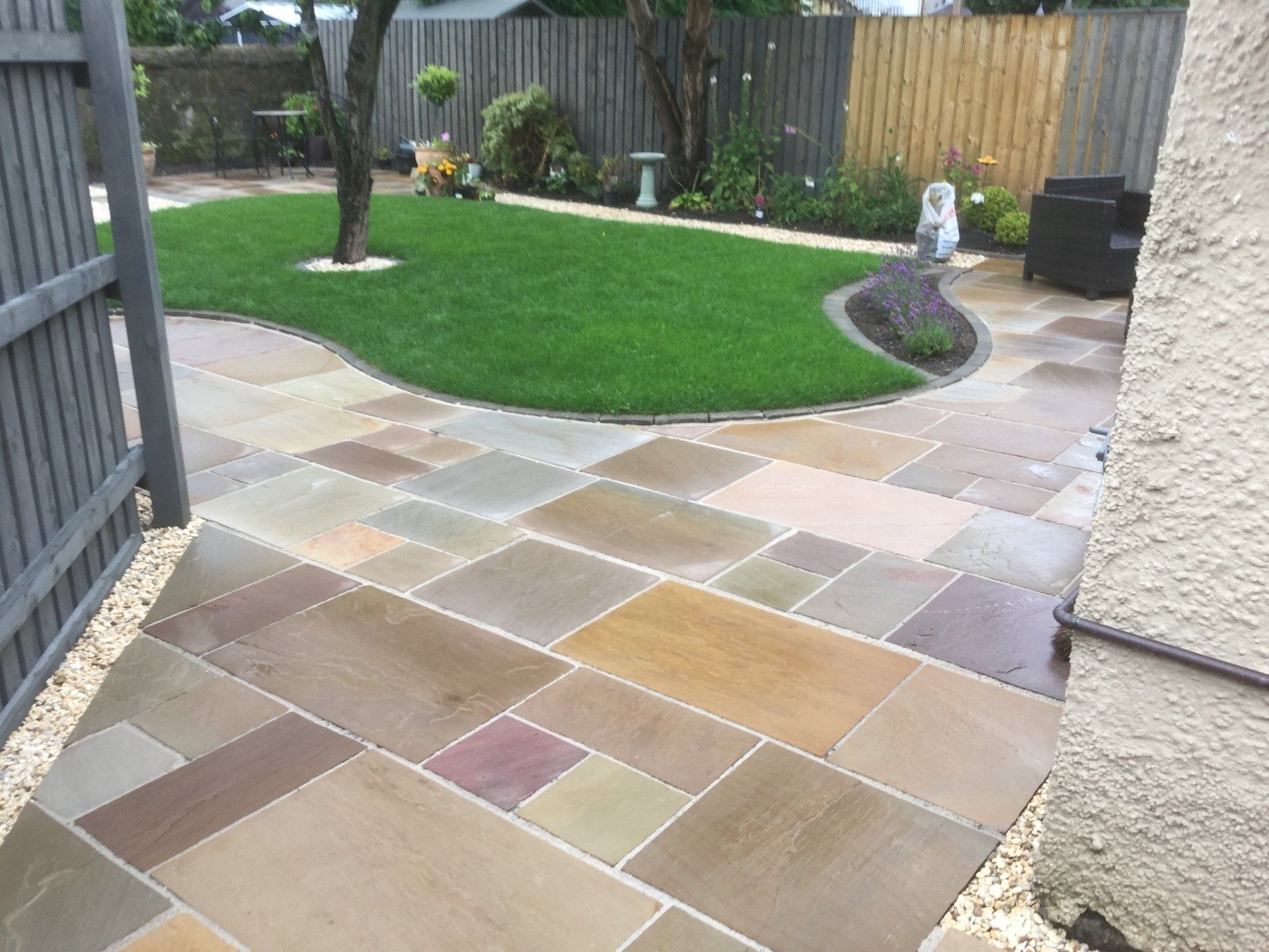 new patio with grassy area in the middle