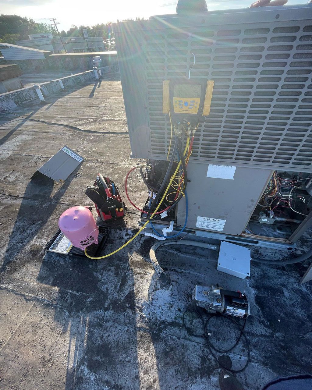 Air conditioner being repaired — Bensalem, PA — D.N.A Heating & Air