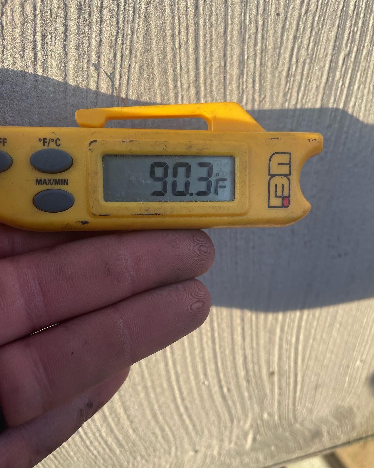 A person holding a digital thermometer — Bensalem, PA — D.N.A Heating & Air