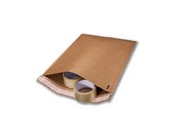 A brown envelope with two rolls of tape inside of it.