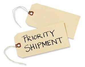Two tags with priority shipment written on them