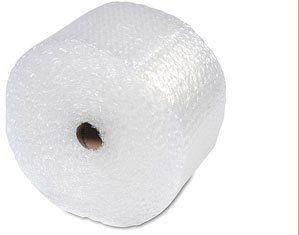 A roll of bubble wrap is sitting on a white surface.
