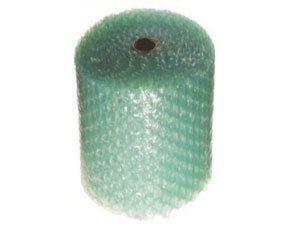 A roll of green bubble wrap with a hole in the middle on a white background.