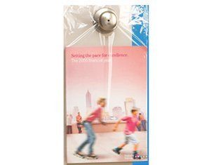 A door hanger with a picture of two people rollerblading