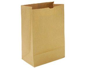 A brown paper bag is sitting on a white surface.