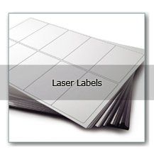 A stack of laser labels sitting on top of each other on a table.