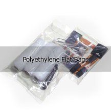 A pair of polyethylene flat bags sitting on top of each other on a white surface.