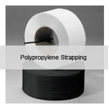 Two rolls of polypropylene strapping are stacked on top of each other on a table.