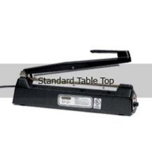 A black plastic bag sealer is sitting on top of a table.