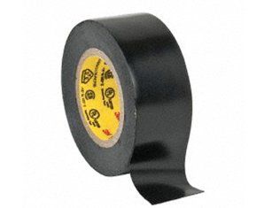 A roll of black tape with a yellow sticker on it