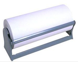 A roll of paper is sitting on top of a paper dispenser.