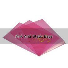 Pink anti static bags are stacked on top of each other on a white background.