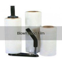 Three rolls of blown hand film are sitting next to each other on a table.