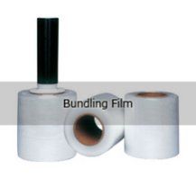 Three rolls of bundling film with a black handle on a white background.