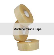 Three rolls of machine grade tape are stacked on top of each other on a white background.