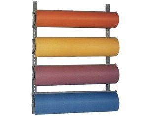 Four rolls of paper are stacked on top of each other on a rack.