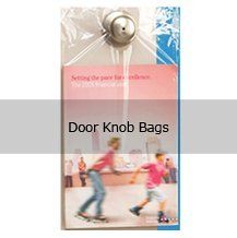 A door knob bag with a picture of a man and a boy on it.