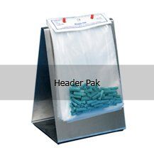 A header pak is a stainless steel stand with a plastic bag filled with blue plastic beads.