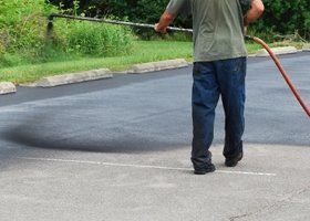 Man Working On The Road — Glastonbury, CT — American USA Paving
