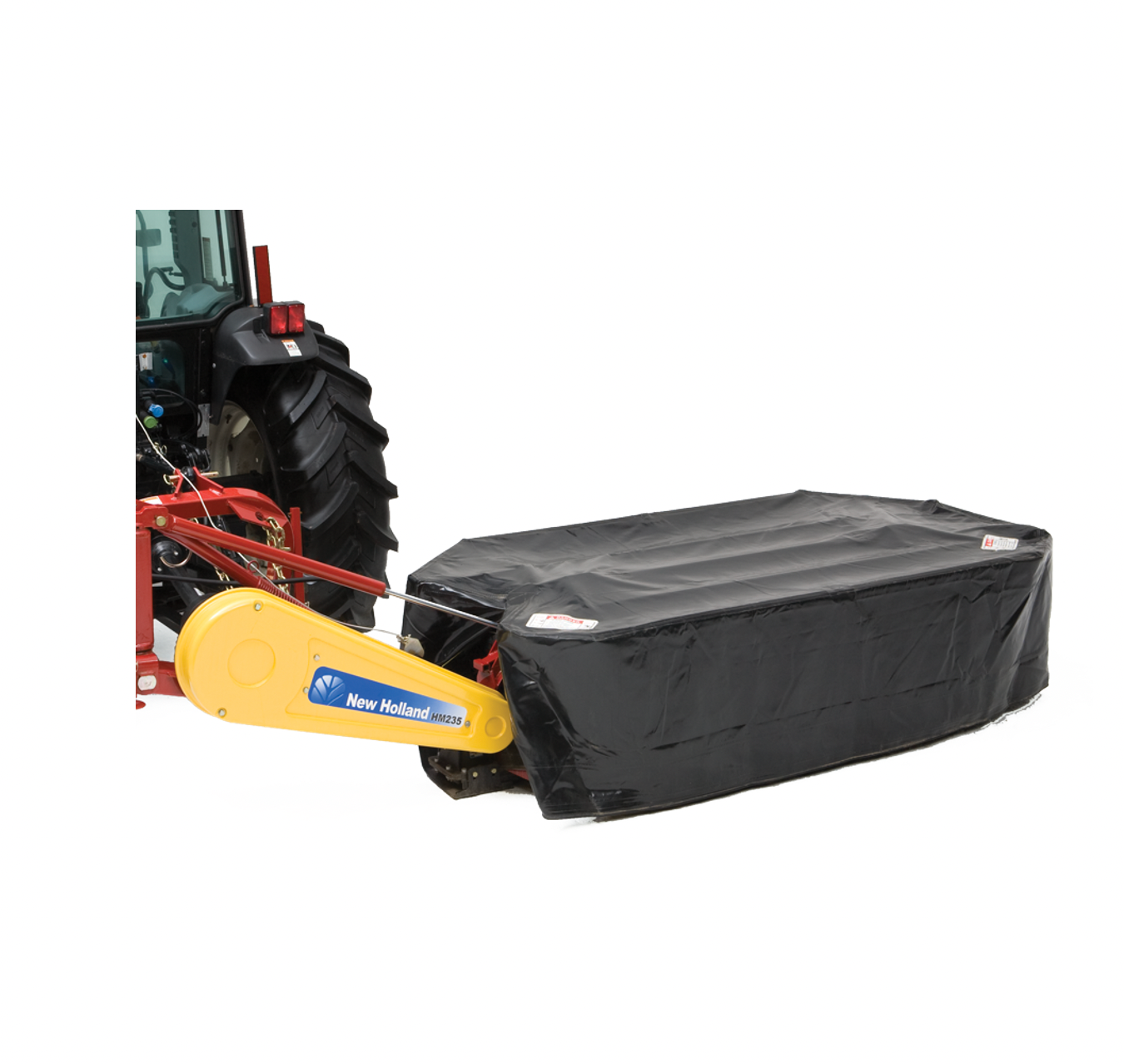 Un tractor con una cortadora de césped acoplada a él.