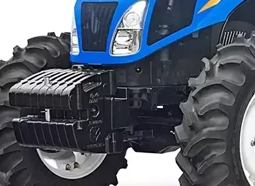 El interior de un tractor azul y blanco con un asiento azul.