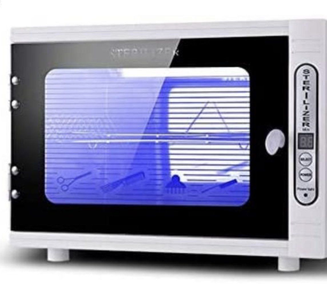 White salon UV sterilizer with a black glass door, glowing blue light inside, and control panel on the right side.