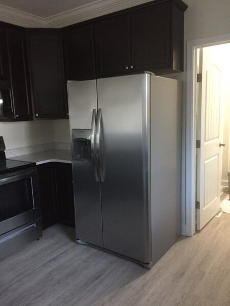 Kitchen Grey Refrigerator — Utility Sheds in Saluda, VA