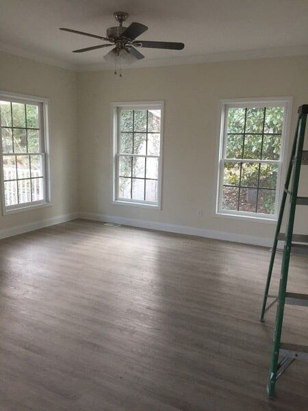 Empty Living Room with Ceiling Fan — Utility Sheds in Saluda, VA