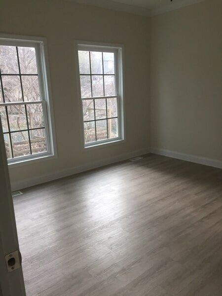 Empty Room with Wooden Floor — Utility Sheds in Saluda, VA