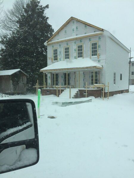 House Covered in Snow — Utility Sheds in Saluda, VA