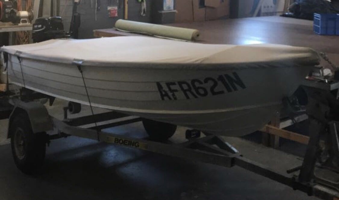 A Small Boat on A Trailer with Afr621n Written on It - Quality Canvas Products In Illawarra, NSW