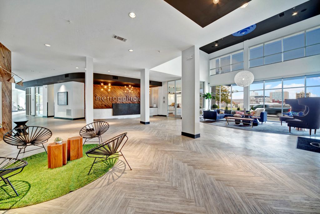 A large clubhouse with a lot of furniture in it