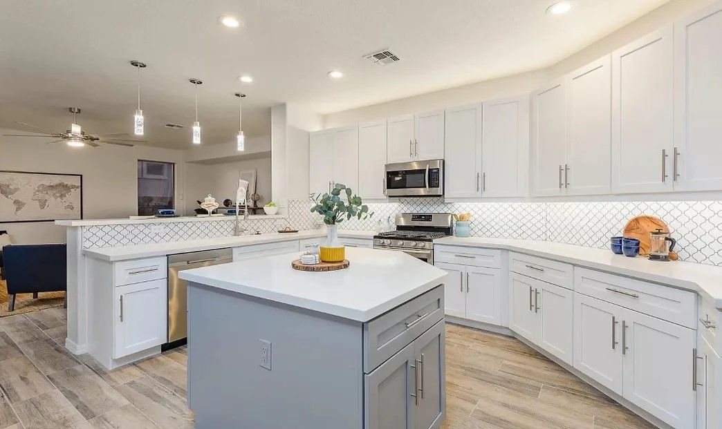 Beautiful kitchen remodel featuring modern cabinets, quartz countertops, and stylish sinks from Sherbi Stone.
