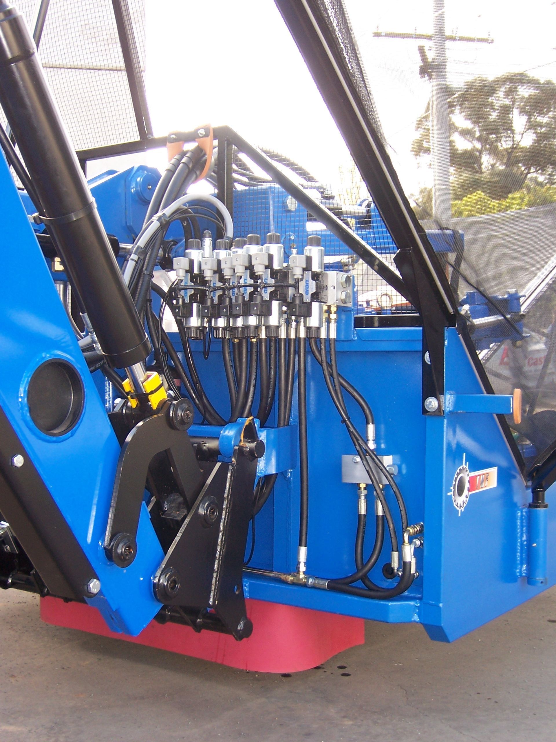 A blue vehicle with a hydraulic system attached to it — TMF Engineering In Benalla, VIC
