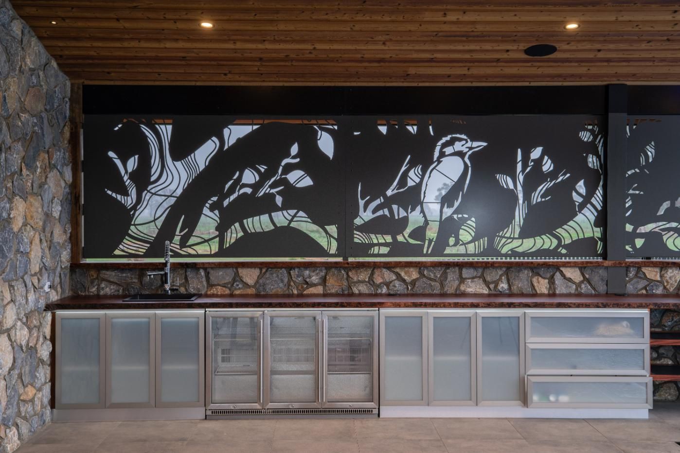 A Kitchen With A Laser Cut Art With Birds And Trees On It — TMF Engineering In Cobram, VIC