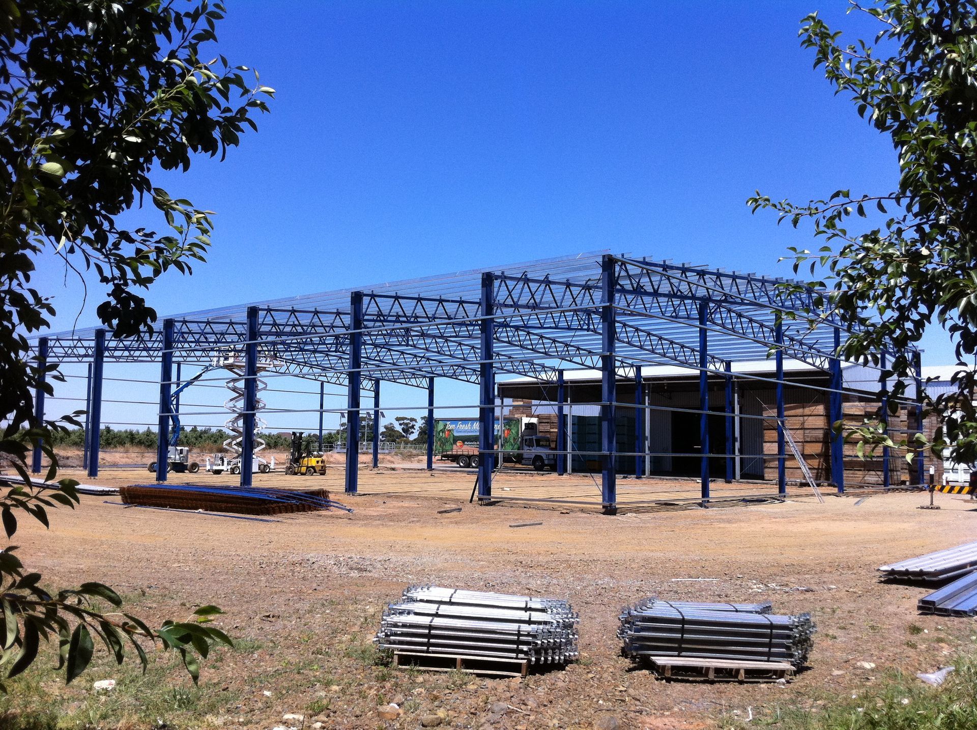 A building under construction with a blue sky in the background — TMF Engineering In Benalla, VIC