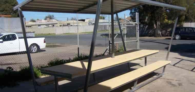 A White Truck Is Parked Next To A Picnic Table Under A Canopy — TMF Engineering In Echuca, VIC
