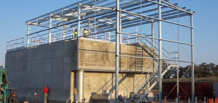A Building Under Construction With Stairs And A Metal Structure — TMF Engineering In Shepparton, VIC