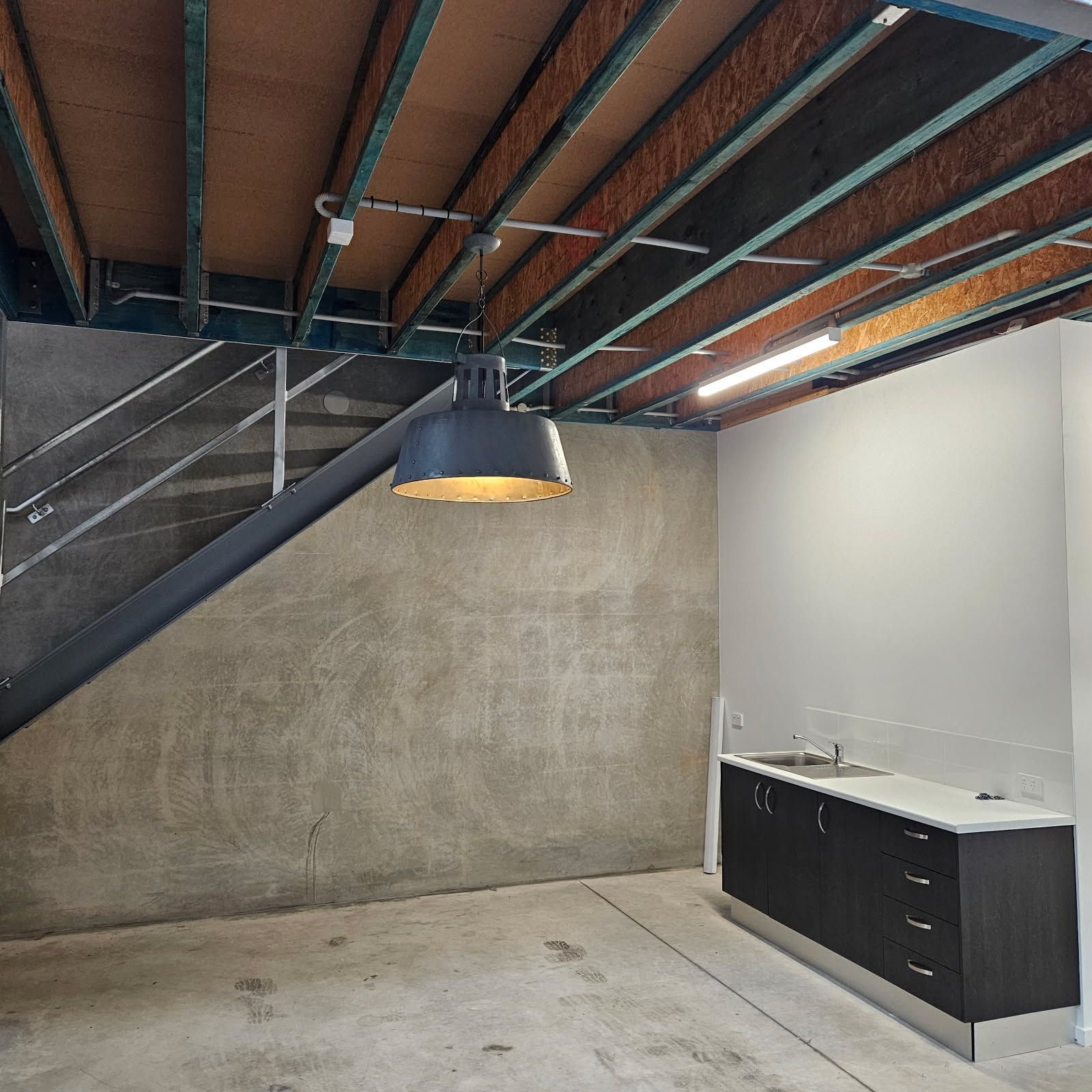 A Person Is Holding A Bunch Of Wires In Their Hands — Derek Knust Electrical In Mons, QLD