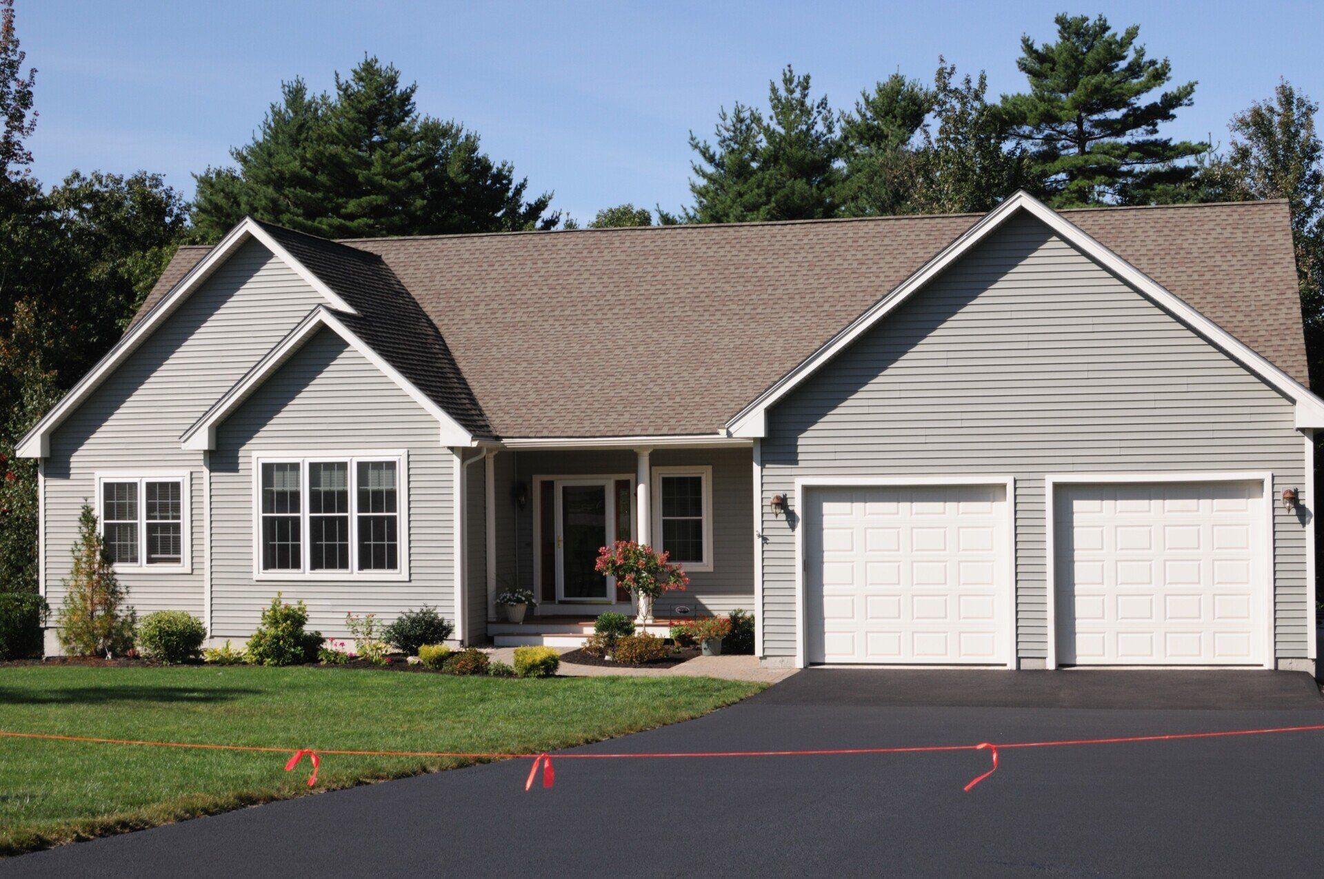 Oil Based Sealcoat in House Driveway — Buckingham, VA — Kinder Construction