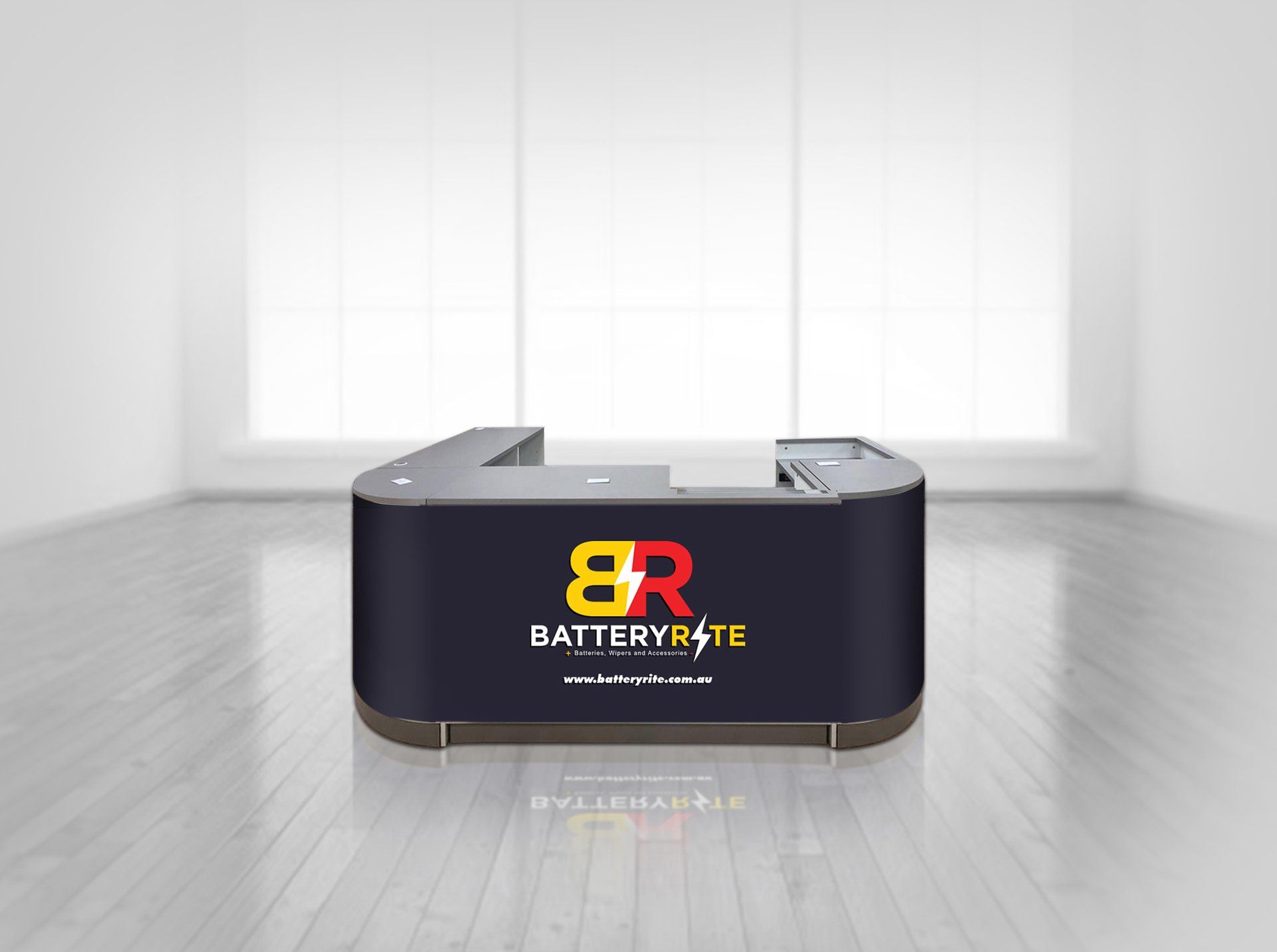 An empty room with a counter that says 8r battery 24 te