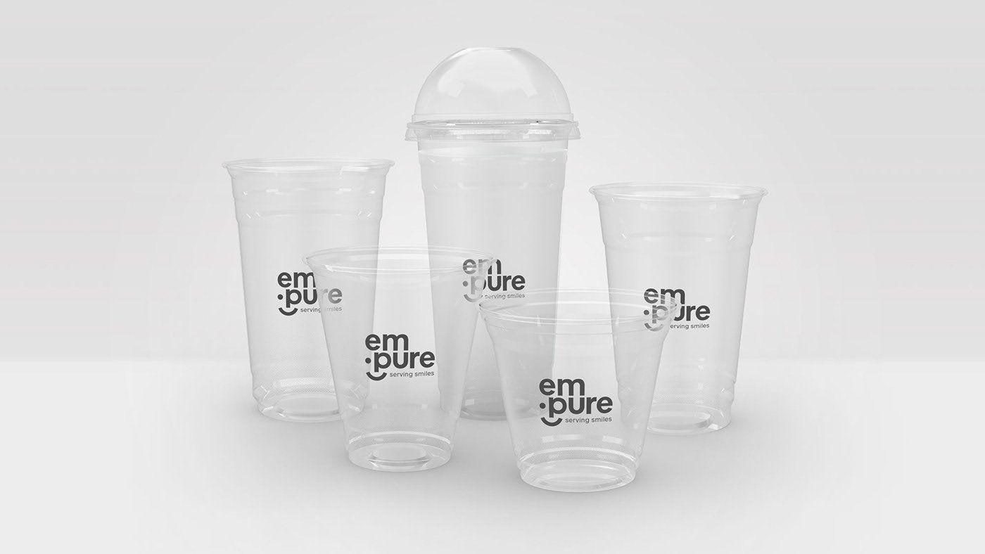 A group of plastic cups sitting on top of each other on a table.