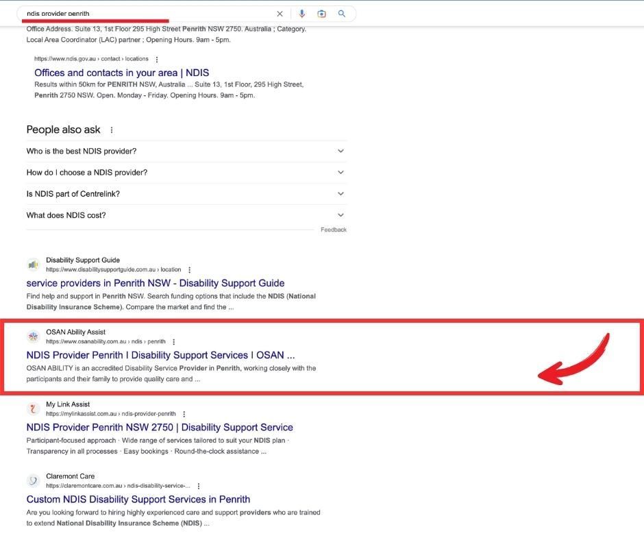 A computer screen with a red arrow pointing to the top of the page.
