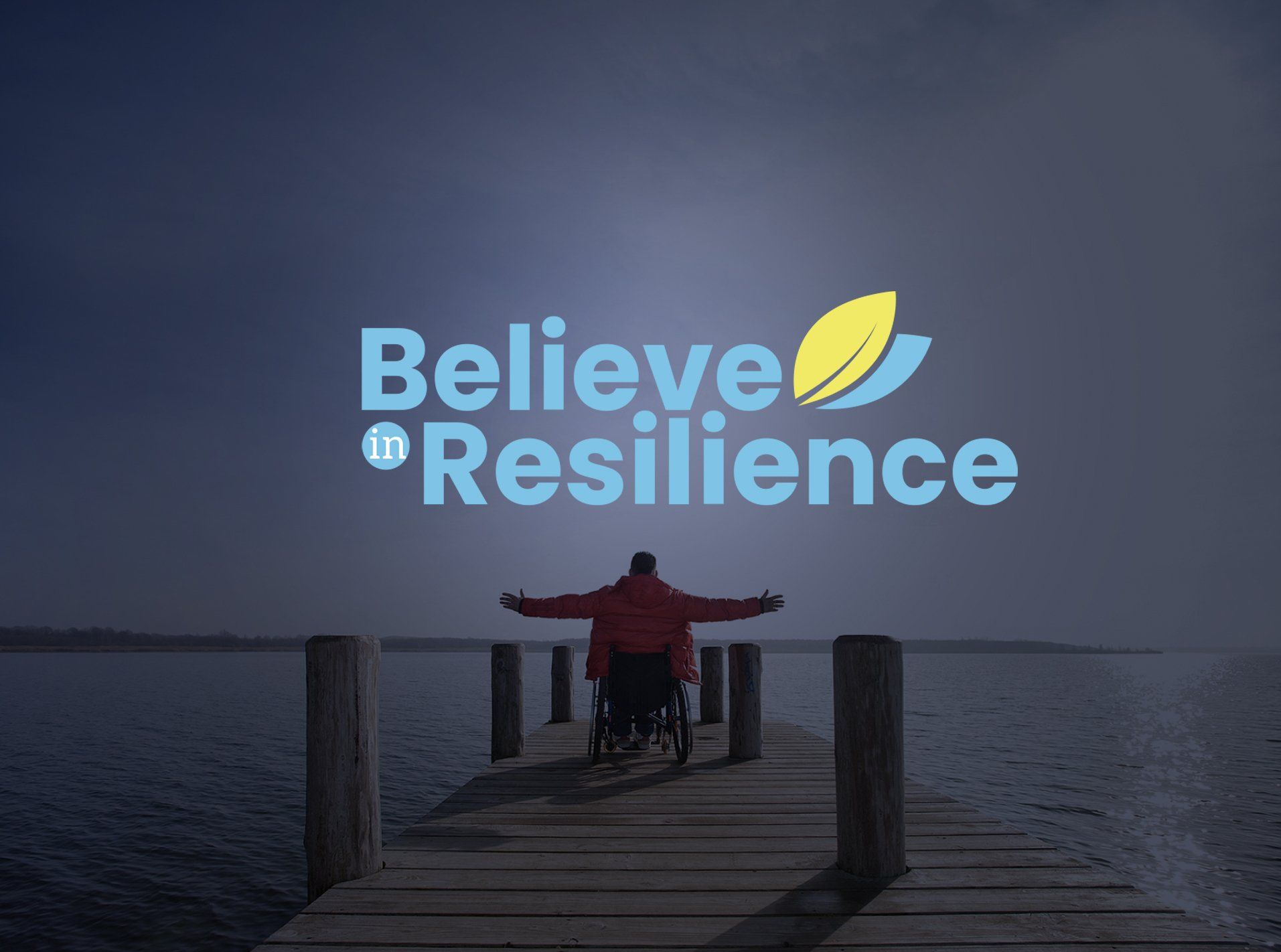 A person in a wheelchair on a dock with the words believe in resilience