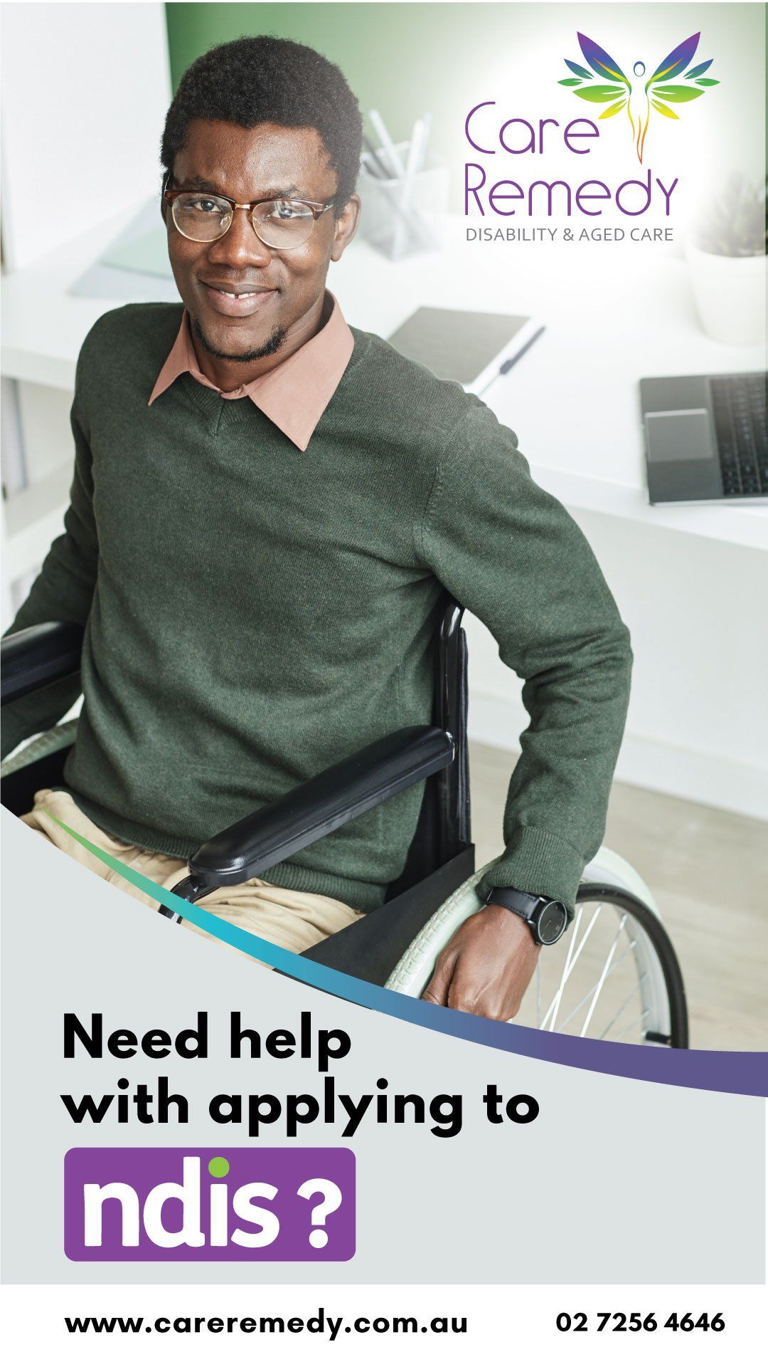 A man in a wheelchair is smiling and looking at the camera