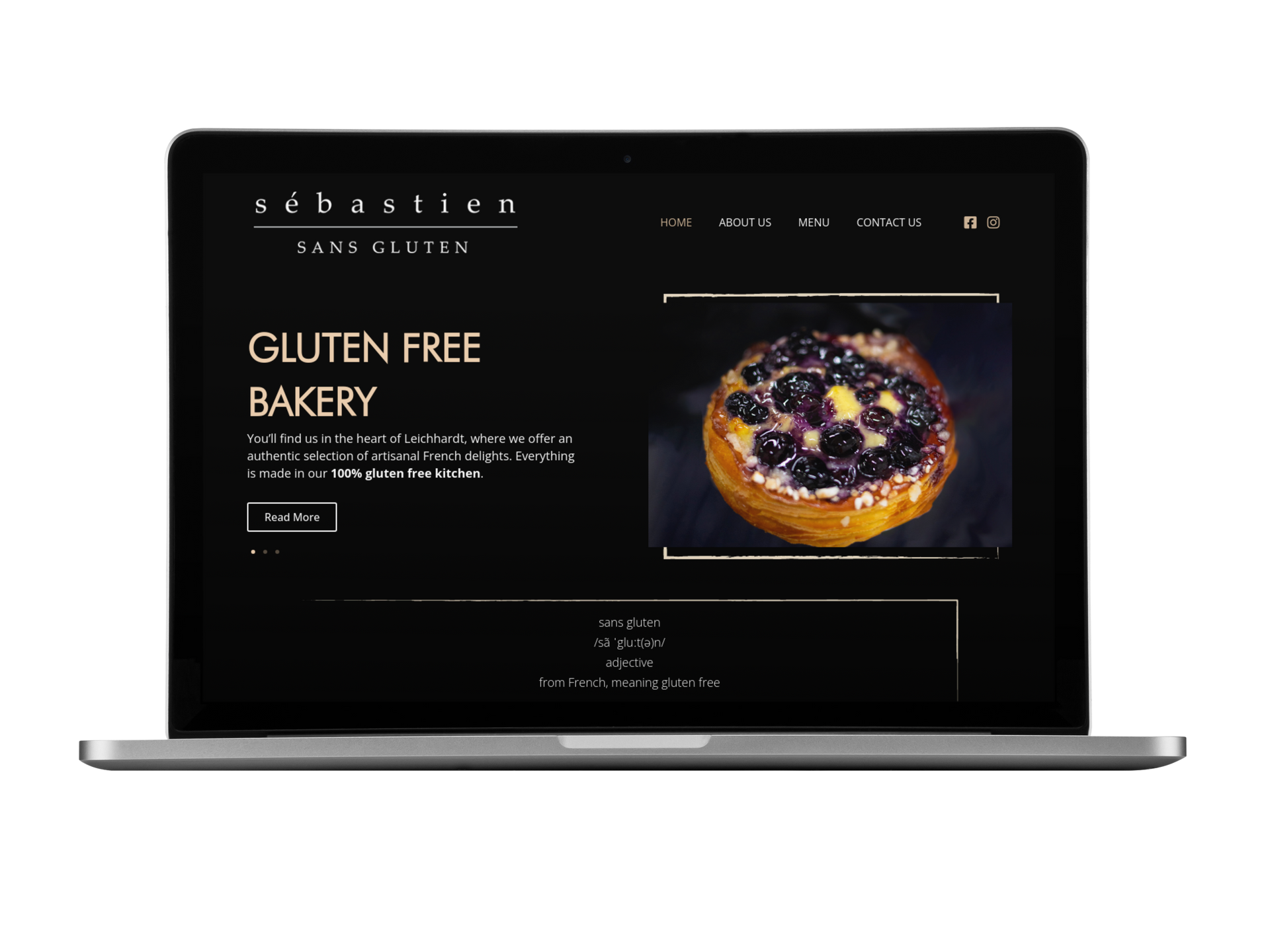 A laptop is open to a gluten free bakery website