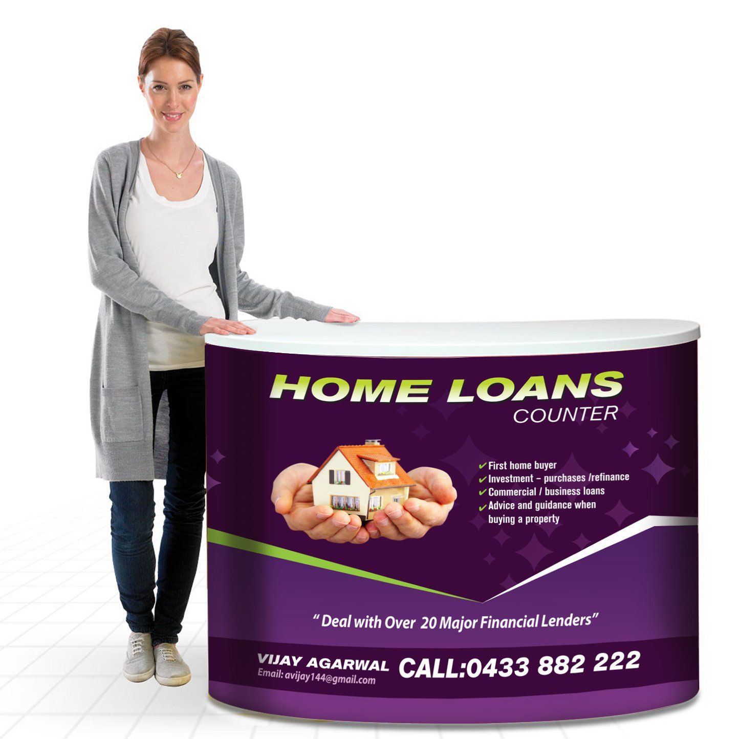 A woman stands in front of a home loans counter