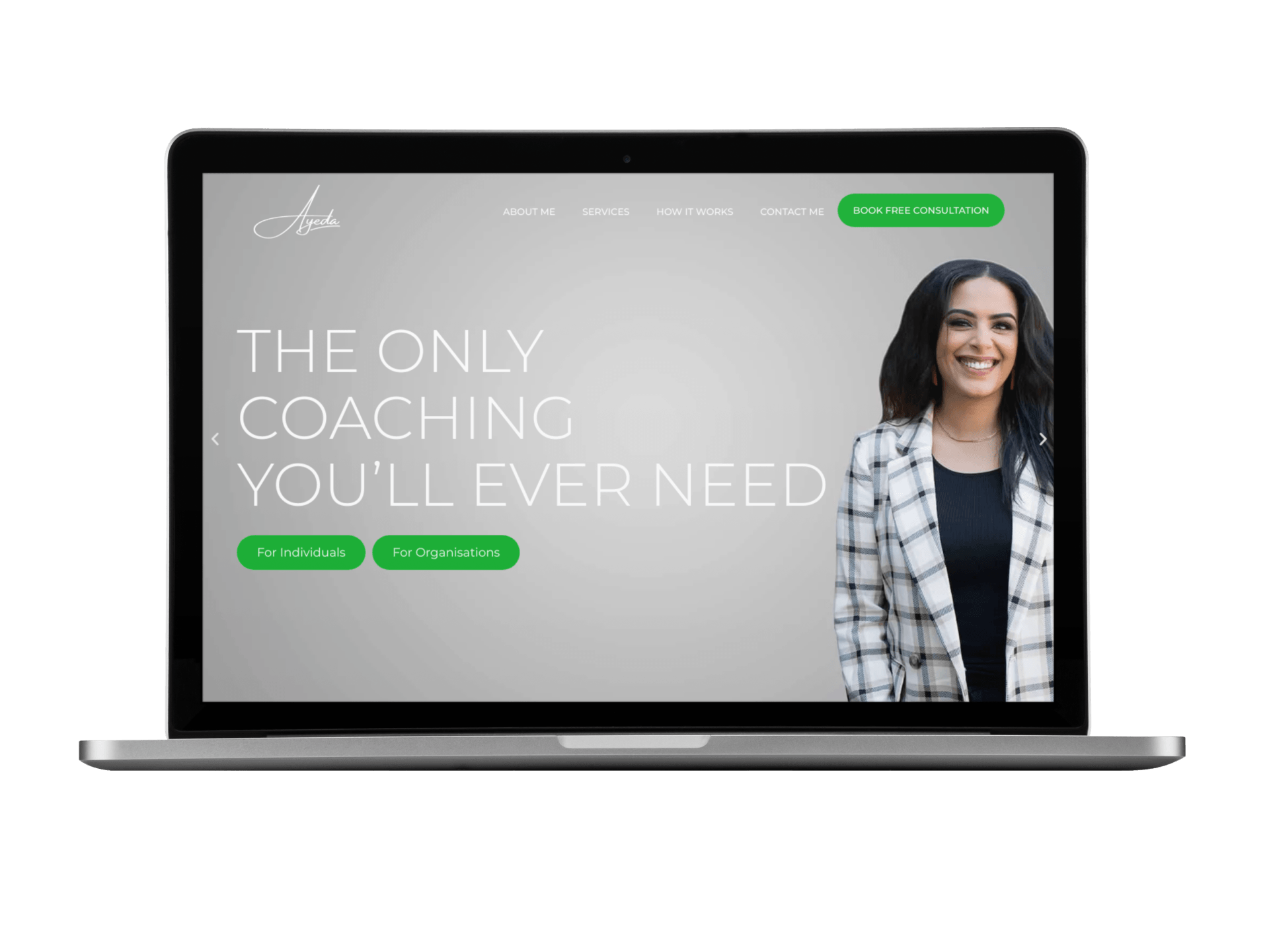 A laptop with a woman on the screen and the words `` the only coaching you 'll ever need ''.