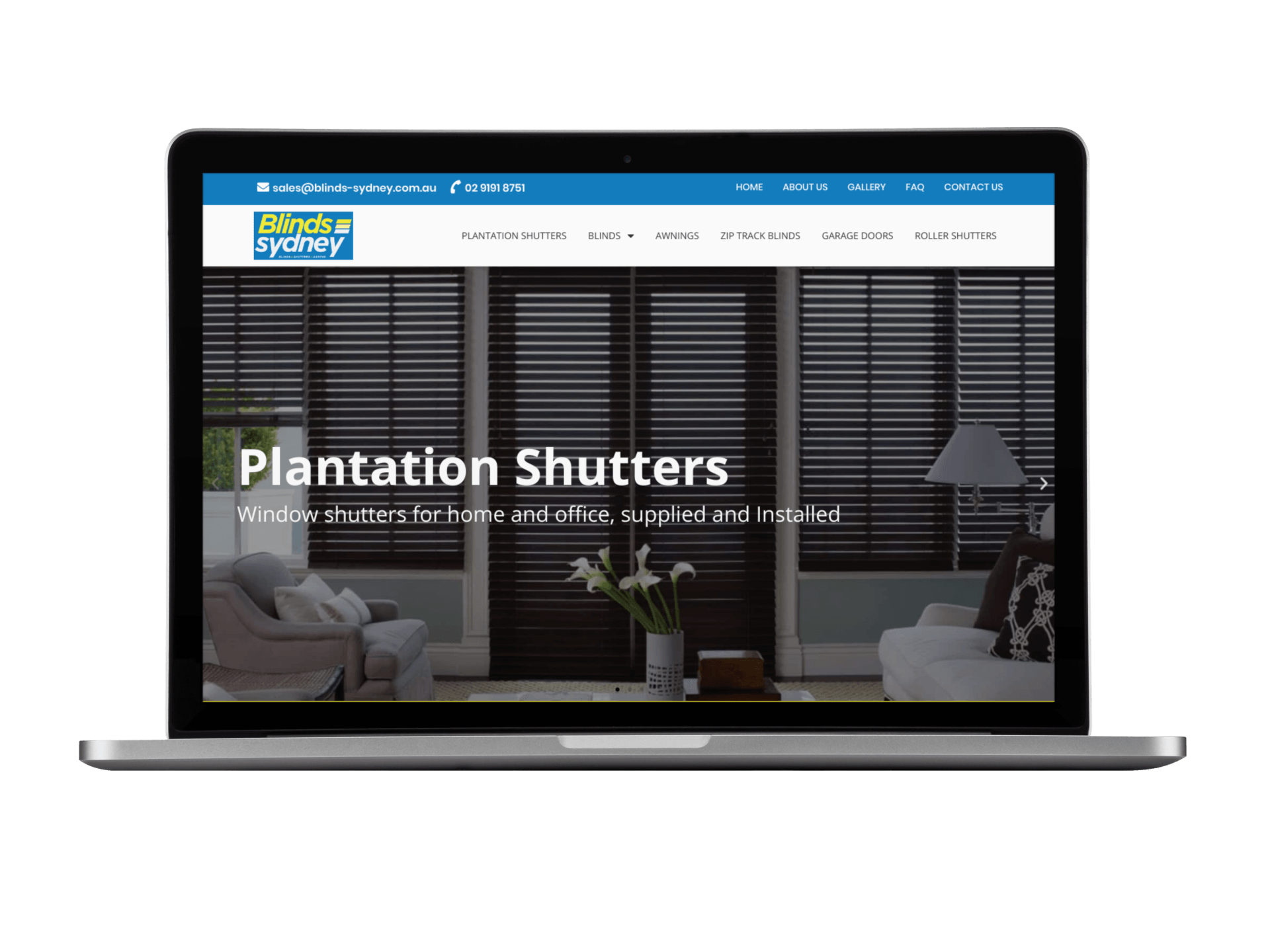 A laptop is open to a website for plantation shutters