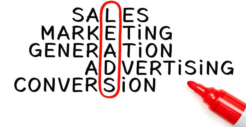 A red marker is pointing to the word sales in the middle of a word cloud.